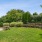 manicured grounds with outdoor grilling station